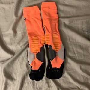 Orange, Gray, and Black Nike Elites